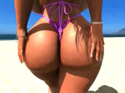 Huge tits huge butt in tiny bikini on the beach